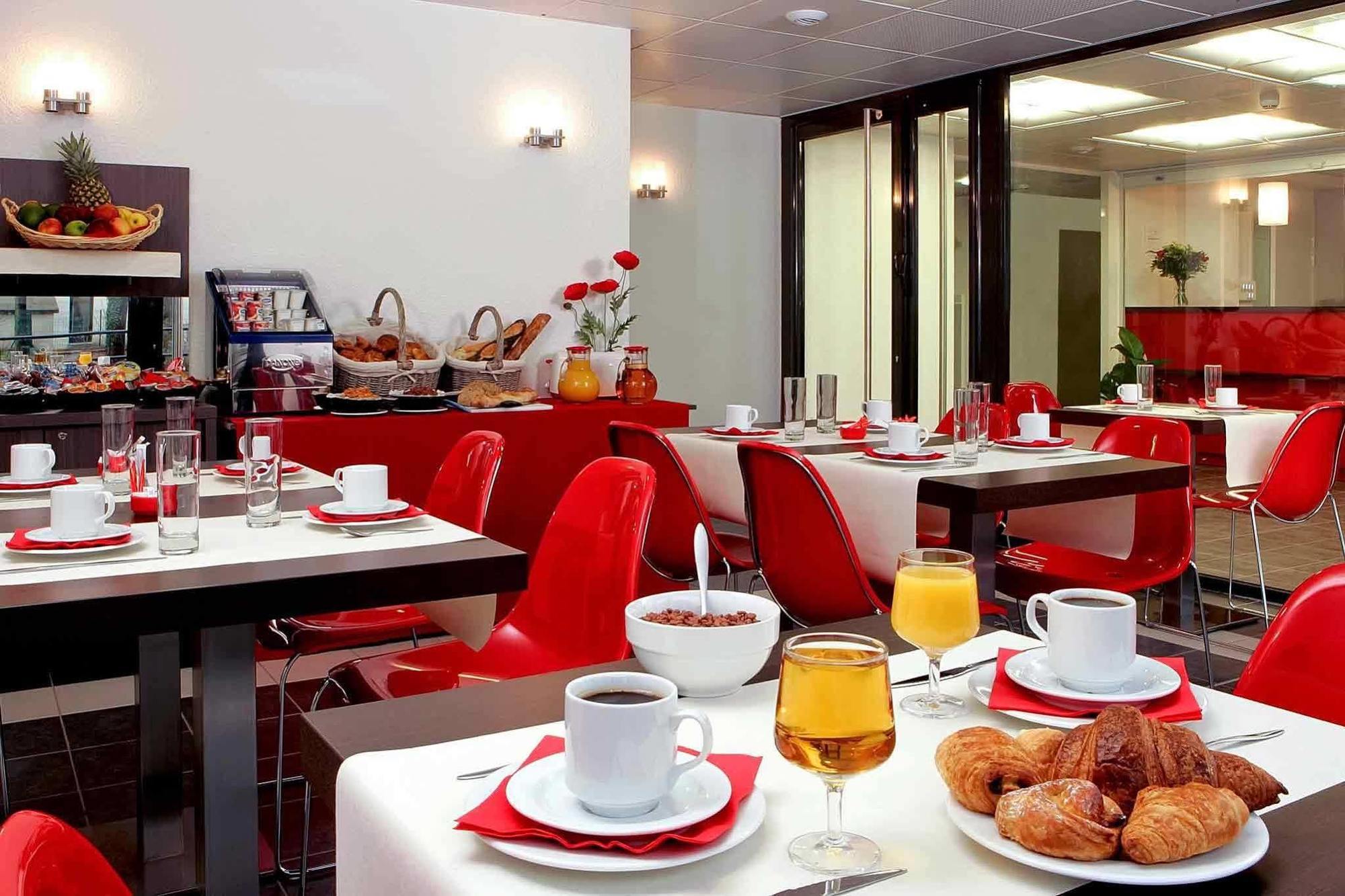 Aparthotel Adagio Access Orléans Restaurang bild